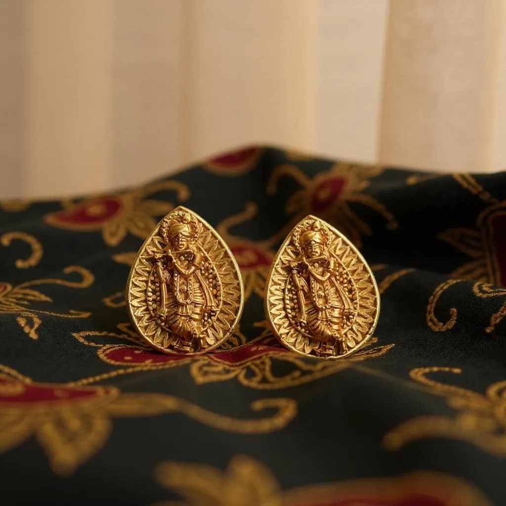Teardrop Krishna Stud Earrings with Sunburst Pattern in Antique Matte Gold